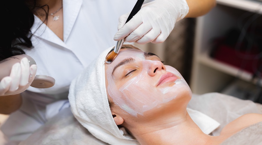 Why are facials important for skin care this summer? 